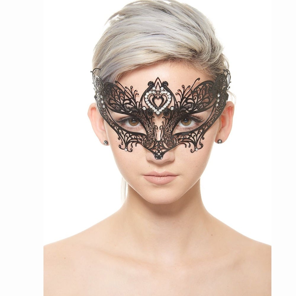 beautiful young girl with grey hair  wearing a black filigree mask  and showing what it looks like on