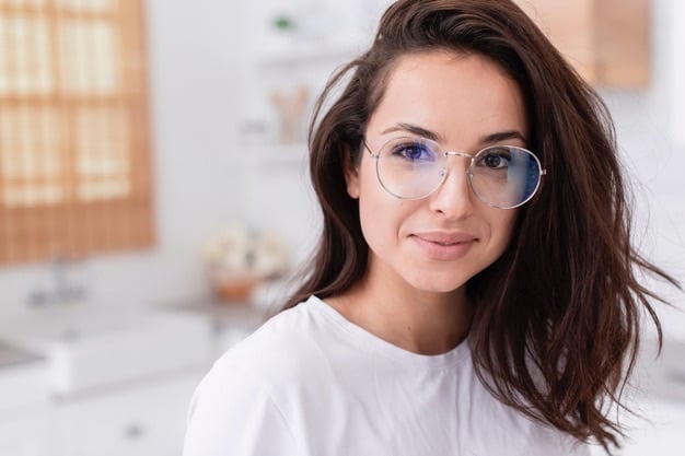 beautiful woman wanting to wearing glasses to a masquerade party