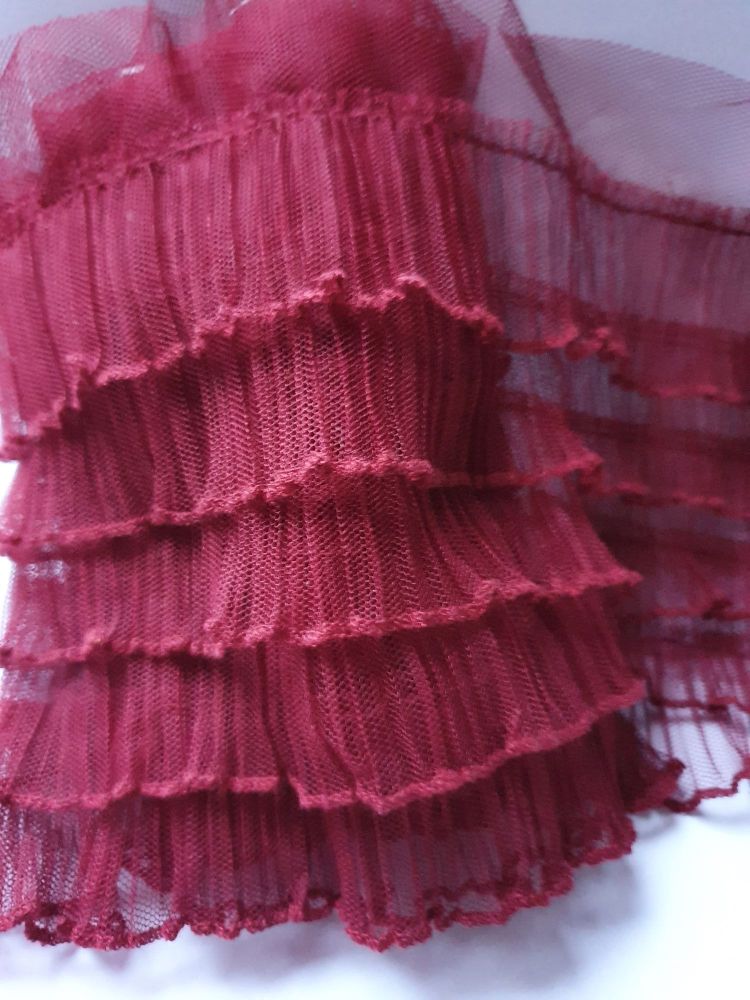Maroon Frillled Netted type flounced fabric