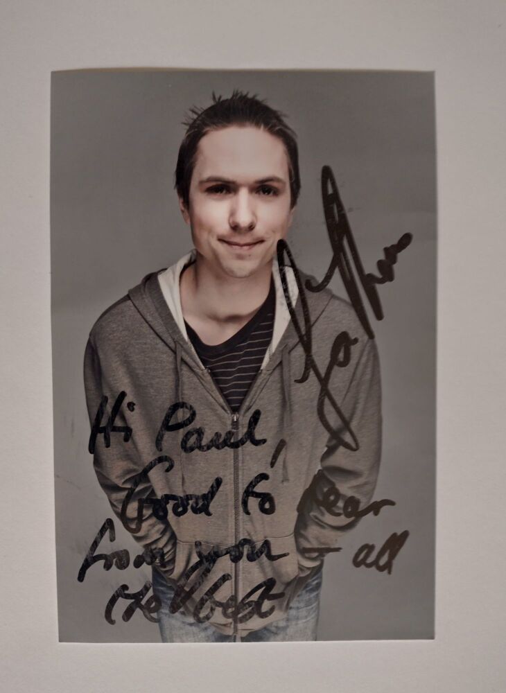Joe Thomas autograph (hand-signed photograph)