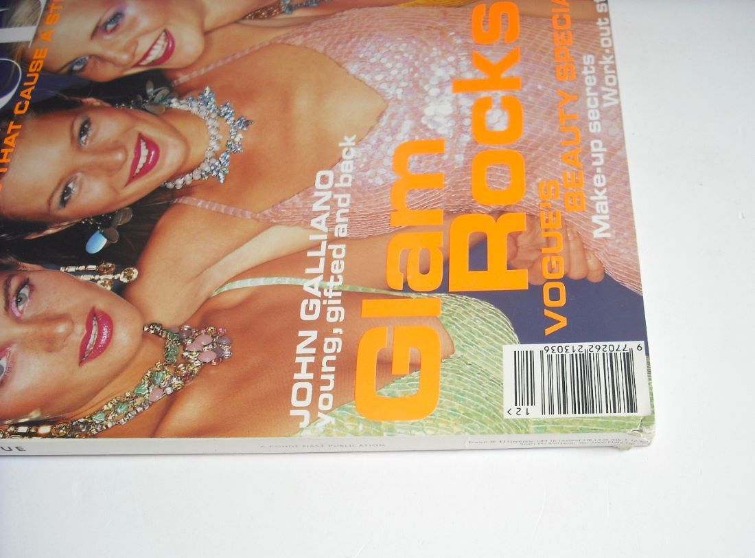 British Vogue magazine - December 1994 - Amber Valletta, Kate Moss and Nadja Auermann cover