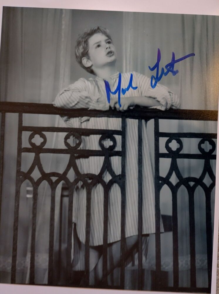 Mark Lester autograph (hand-signed photograph)