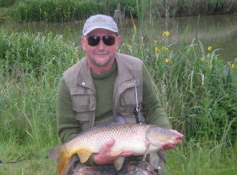 Les Smith & his 16lb Common Carp