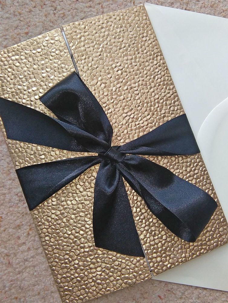 Sequin paper and bow gatefolds