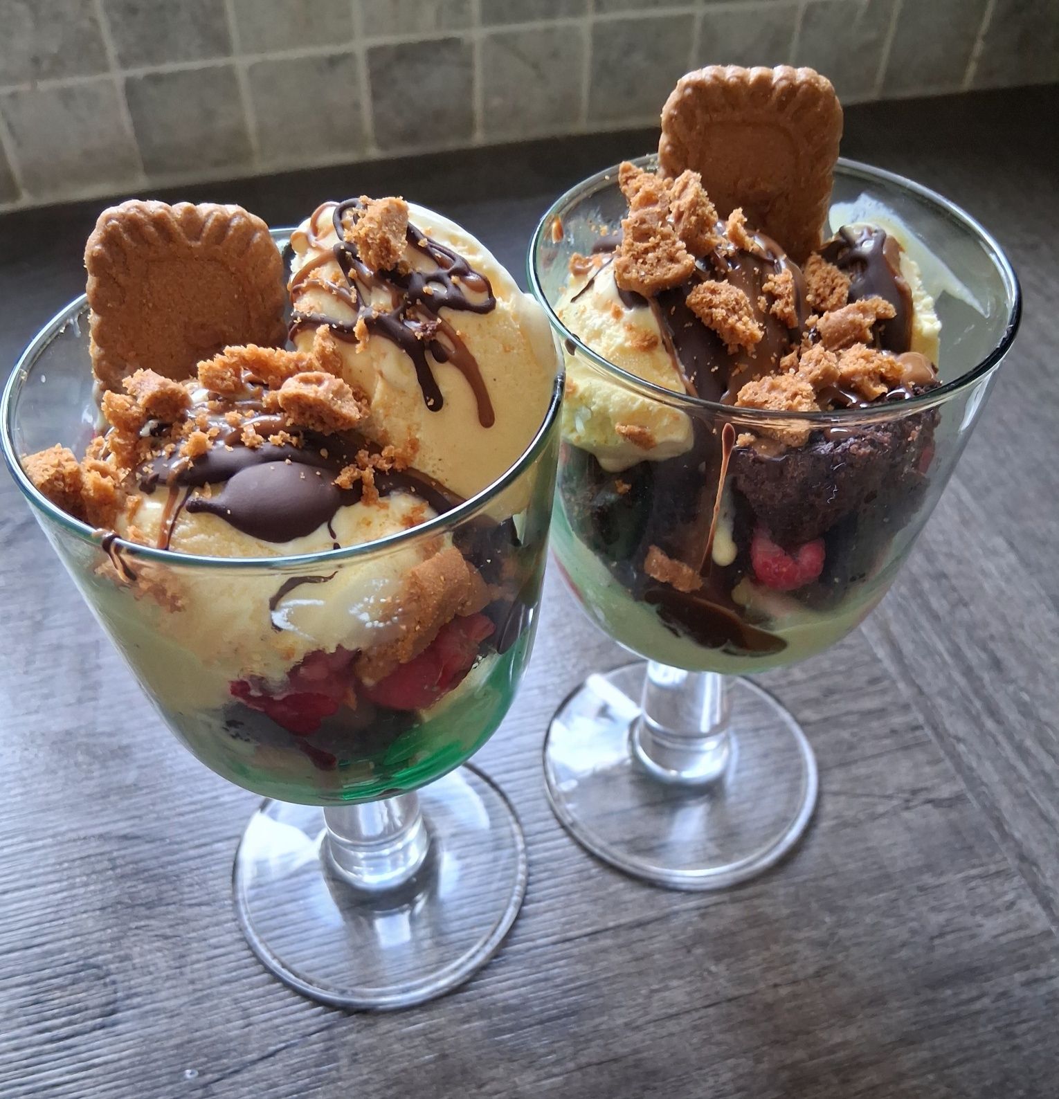 Chocolate Brownie Sundae with raspberries and biscoff