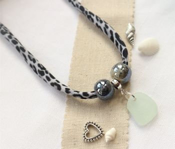 Leopard print necklace with beads and sea glass
