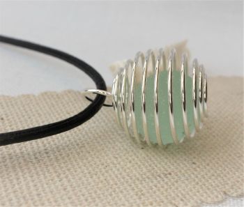Sea glass marble in a basket