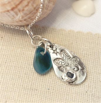 Butterfly in silver clay with stripes