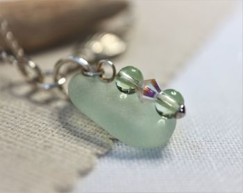 Green sea foam with charm