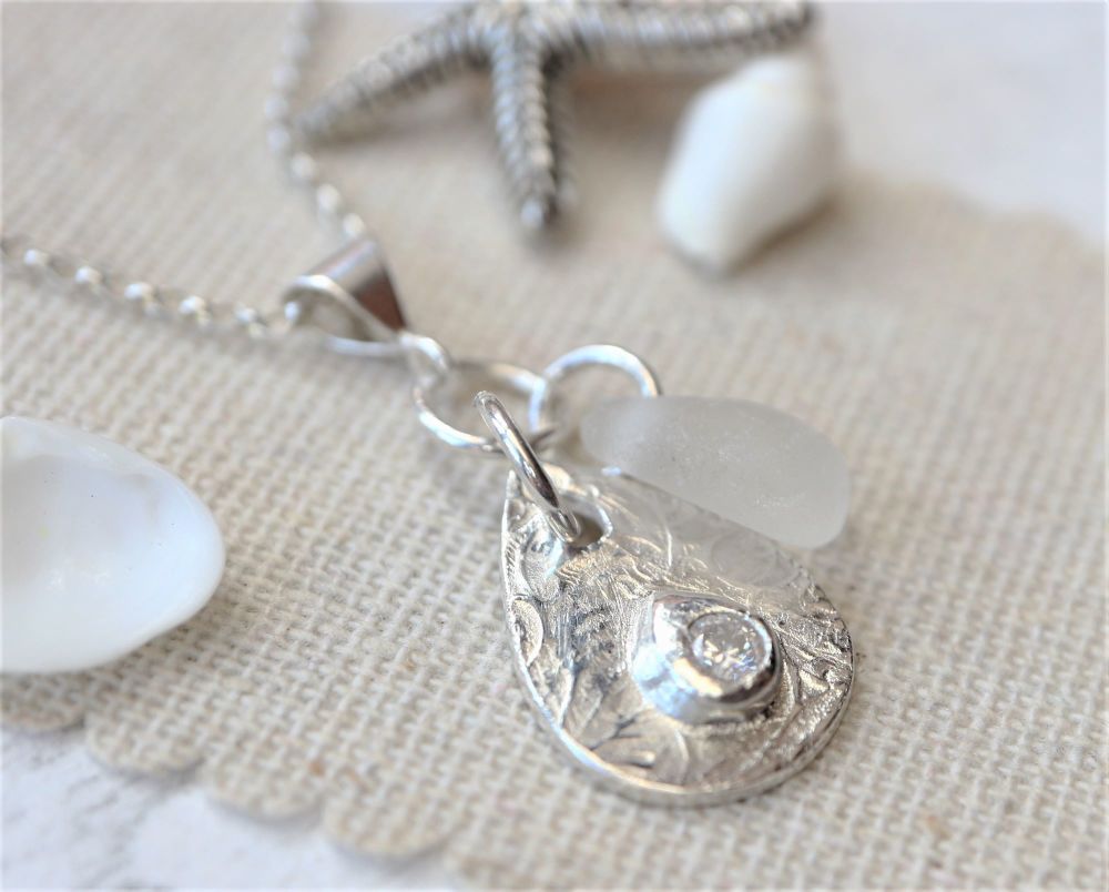 Silver teardrop with white