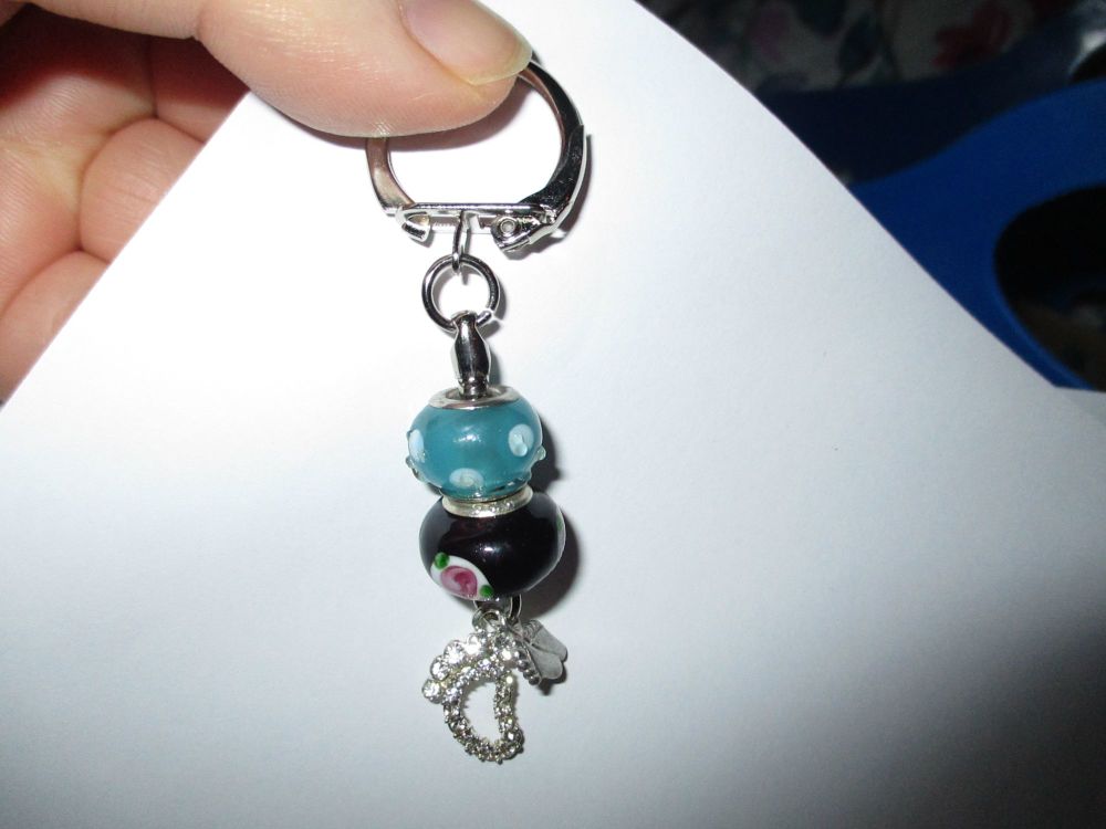 Blue Black Bead and Two Feet Themed Metal Charm Keyring