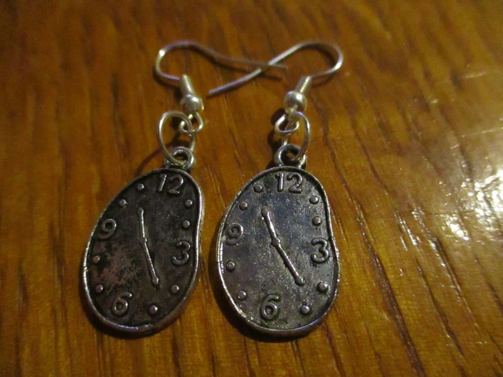 Silver tone Melted Clock Styled Earrings