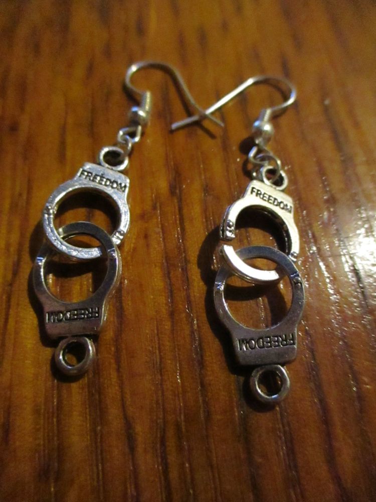Silver tone Handcuffs (says Freedom on them) Styled Earrings