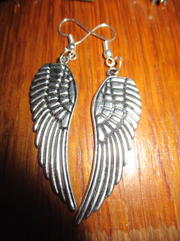 Silver tone Big Feather Wings Styled Earrings