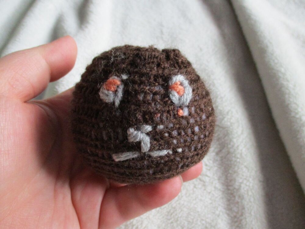 Dark Brown Poppop Ball - Grey Orange Features -  Knitted Soft Toy