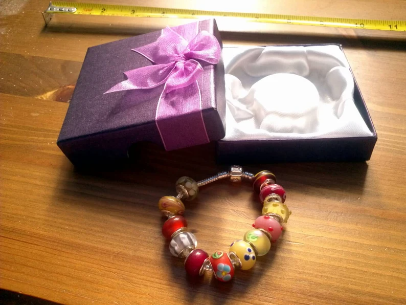 Stunning Warm Reds and Yellows Summer charm bracelet. Snake Chain with snap