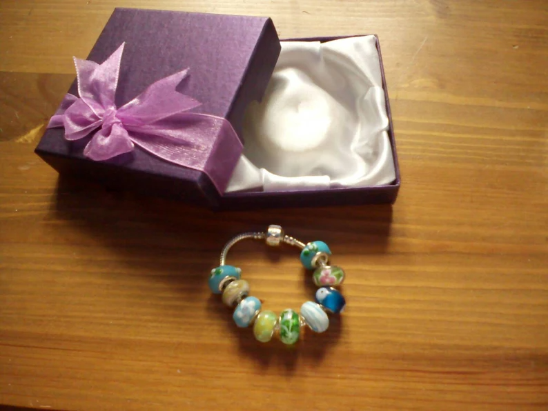 Stunning Seaside Greens Summer charm bracelet. Snake Chain with snap closure. Gift boxed.