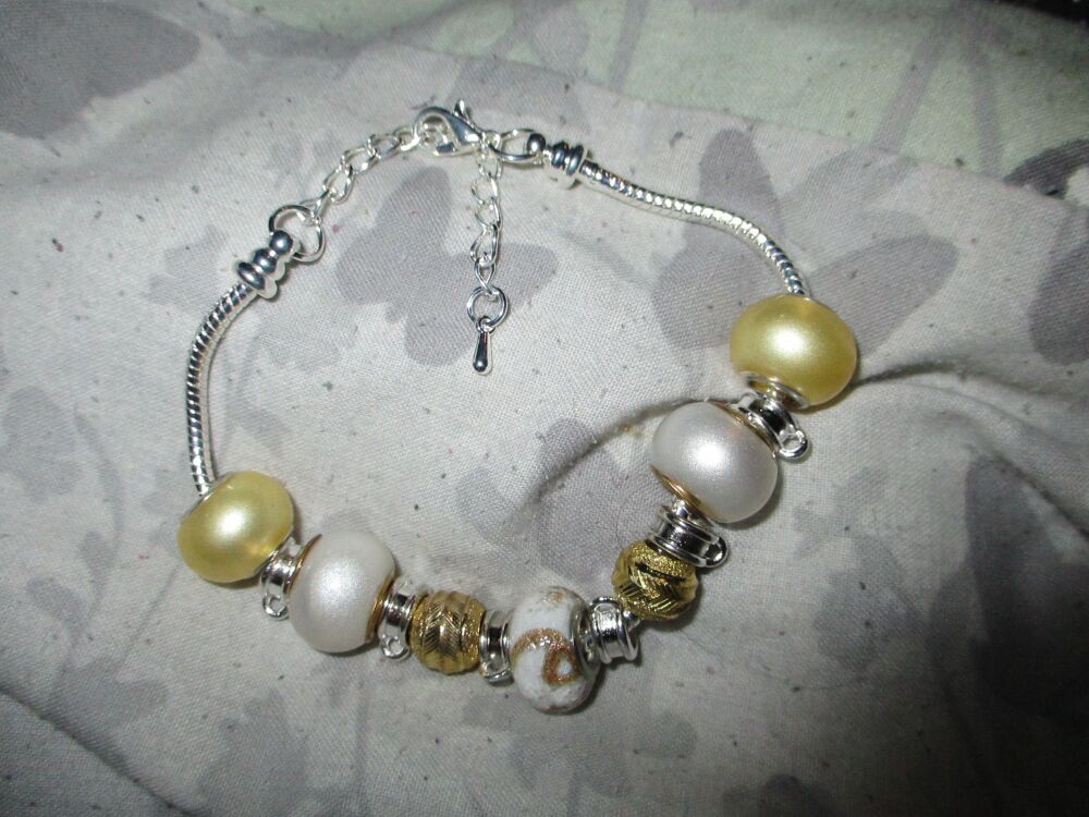 White and Gold Tone Beads Charm Bracelet with adjustable chain and 6 Charm spaces