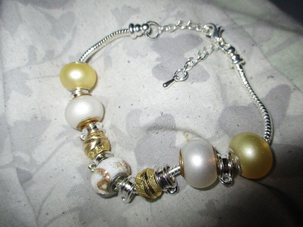 White and Gold Tone Beads Charm Bracelet with adjustable chain and 6 Charm spaces