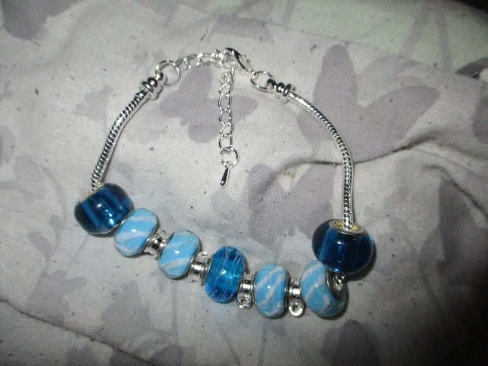 Blue Swirls Selection Beads Charm Bracelet with adjustable chain and 4 Charm spaces