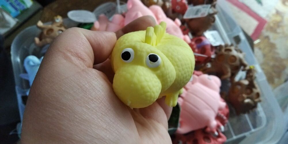 Pale Yellow Light Up Puffy Dinosaur with colourful LED ball inside - Hoot