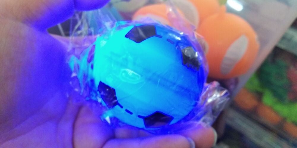 Blue light up small football with colourful LED ball inside - Hoot