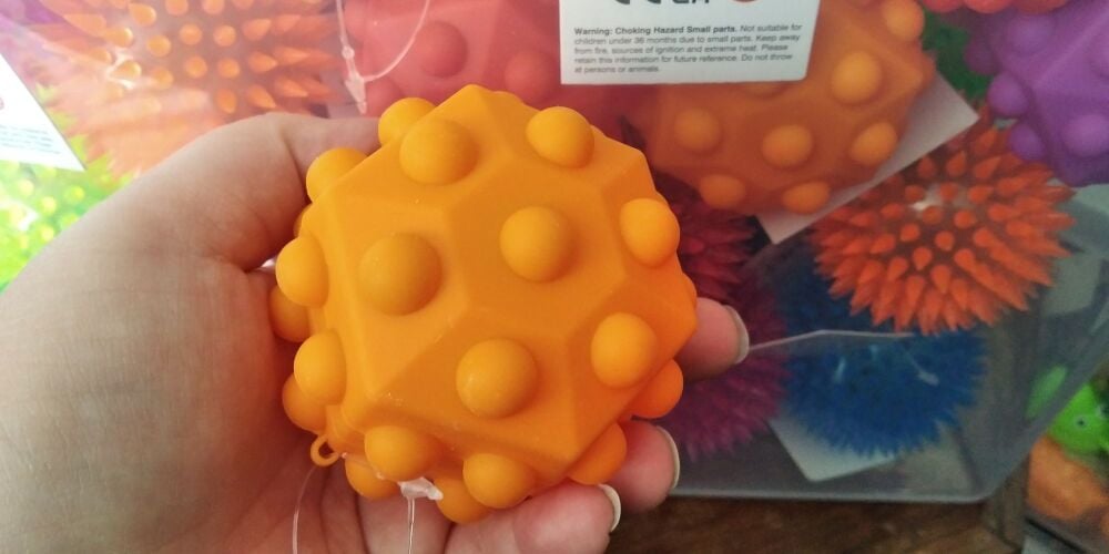 Hollow Orange Hexagonal Sensory Pop Ball Toy - Hoot