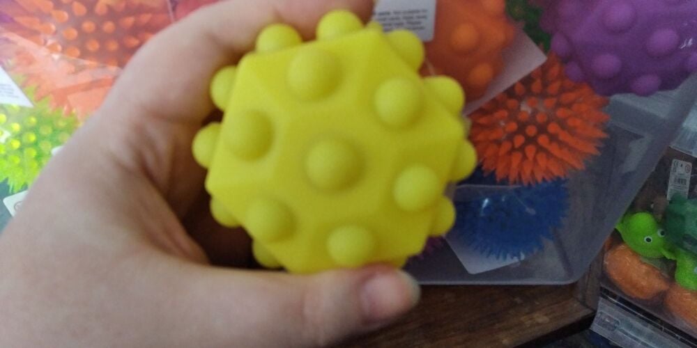 Hollow Yellow Hexagonal Sensory Pop Ball Toy - Hoot