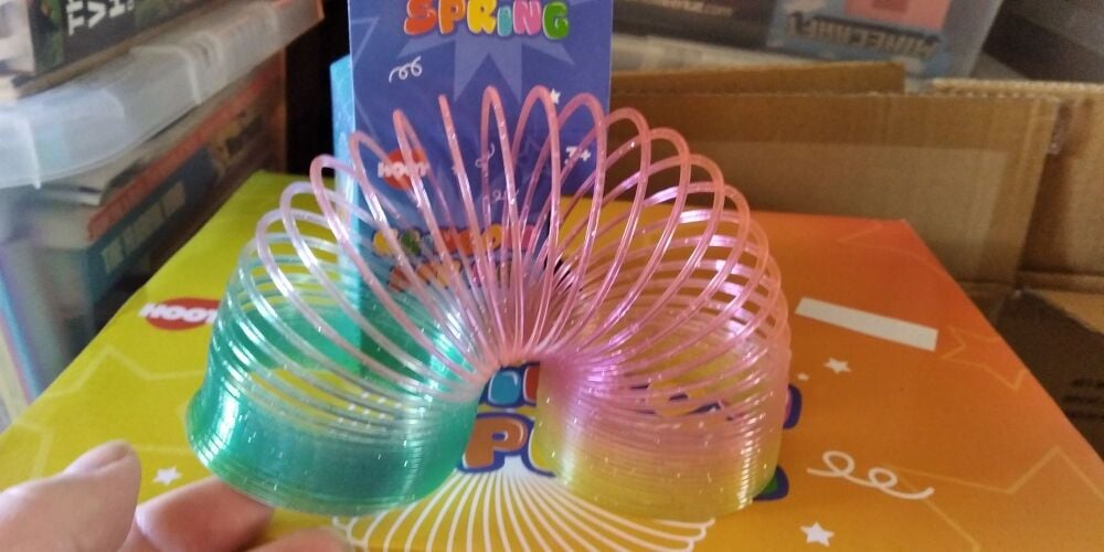 Clear Glittery Design Stretchy Rainbow Spring Toy - Hoot