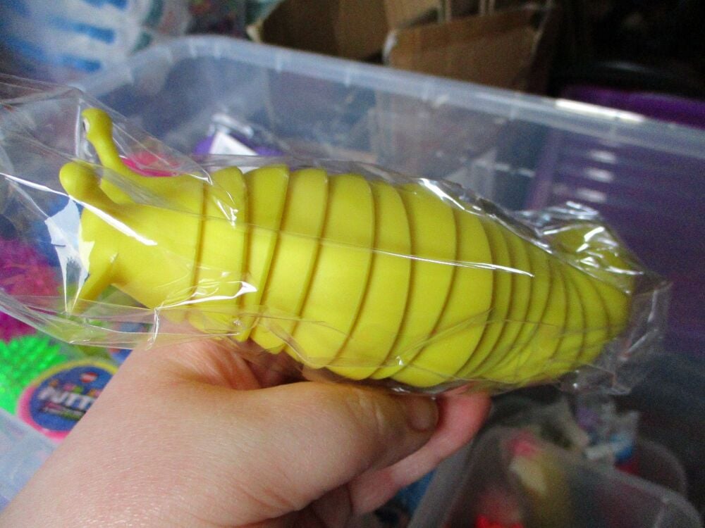 Yellow Plastic Wriggly Slug Fidget Toy Figure - Hoot