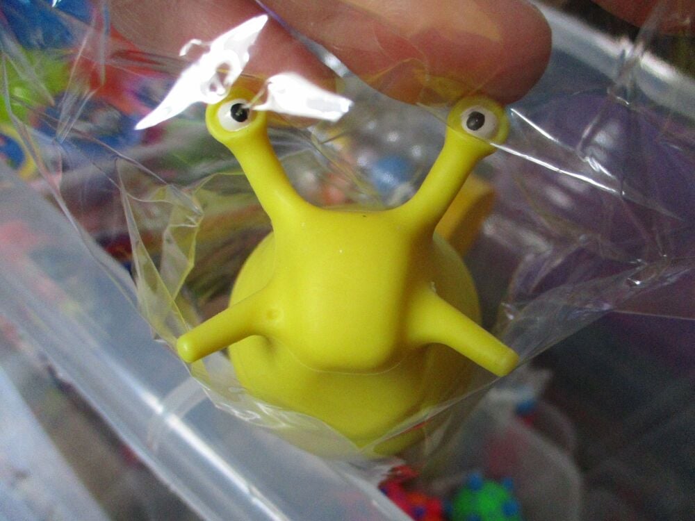 Yellow Plastic Wriggly Slug Fidget Toy Figure - Hoot