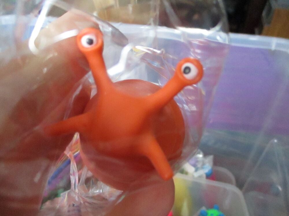 Orange Plastic Wriggly Slug Fidget Toy Figure - Hoot