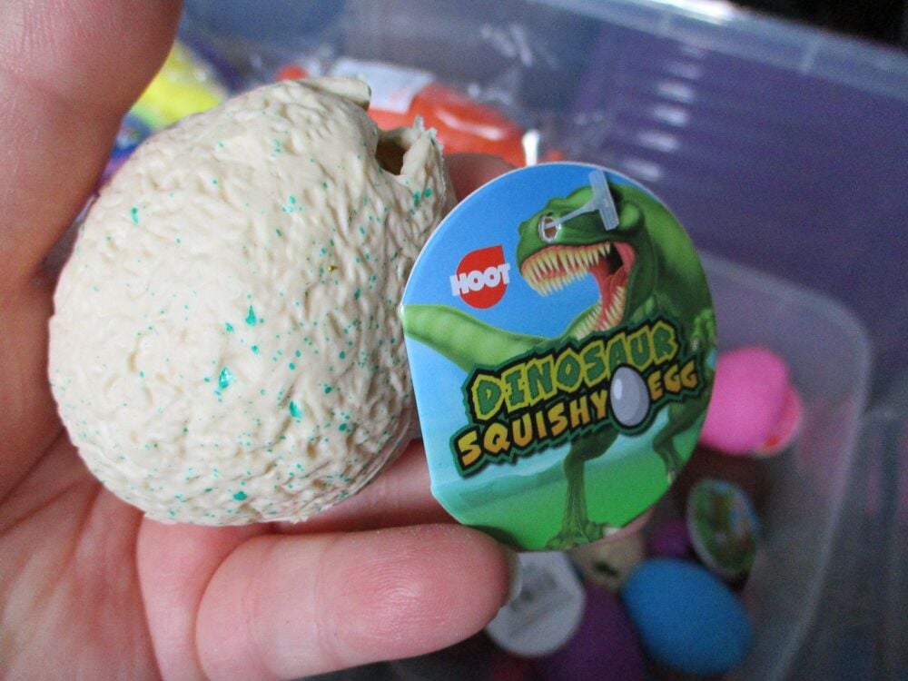 Light Cream Squishy Dinosaur Egg - Liquid Filled with baby Triceratops Dino inside - Hoot