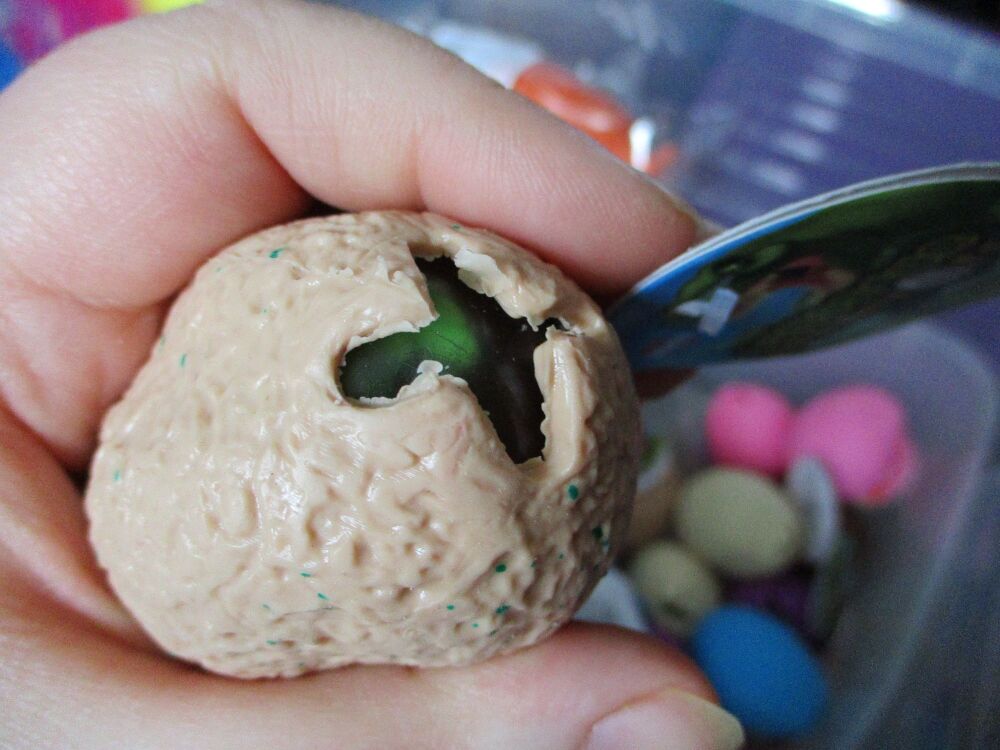 Light Brown Squishy Dinosaur Egg - Liquid Filled with baby Raptor Dino inside - Hoot