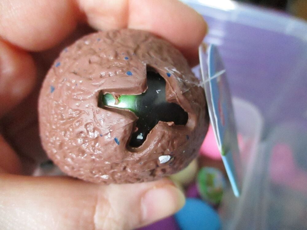 Brown Squishy Dinosaur Egg - Liquid Filled with baby T-Rex Dino inside - Hoot