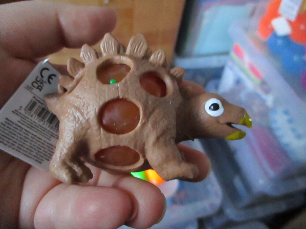 Brown Stegosaurus Squishy Bead Dinosaur - Liquid Filled with coloured beads