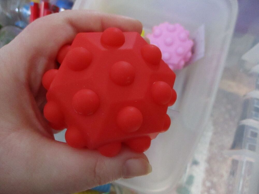 Hollow Red Hexagonal Sensory Pop Ball Toy - Hoot