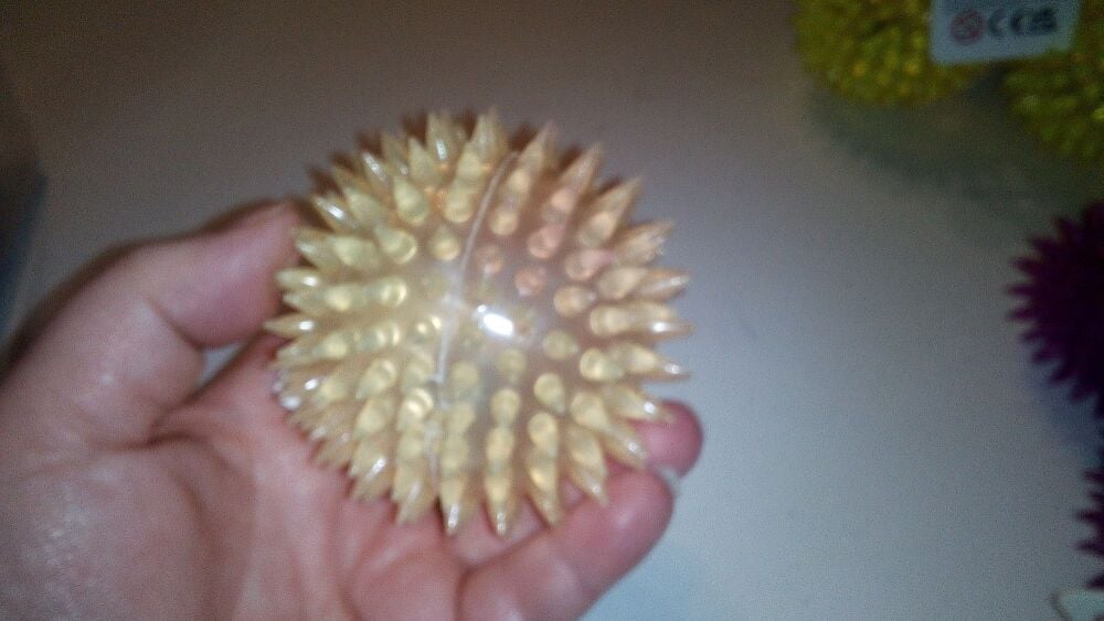 Pale Peachy Orange Light Up Spikey Ball Toy - Hoot