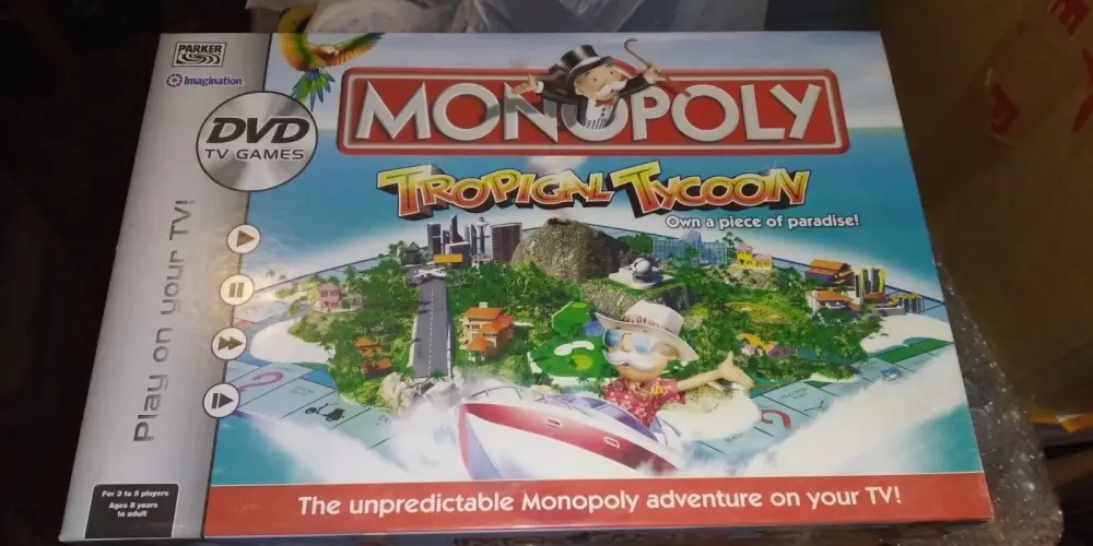Monopoly Tropical Tycoon Board Game DVD Hasbro 2007 - New But Opened . Complete
