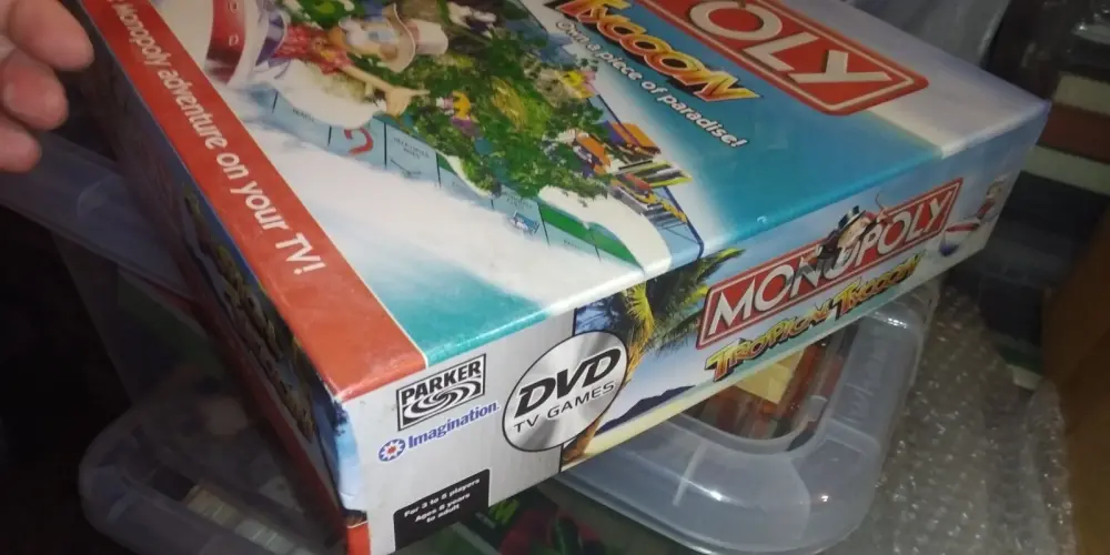 Monopoly Tropical Tycoon Board Game DVD Hasbro 2007 - New But Opened . Complete
