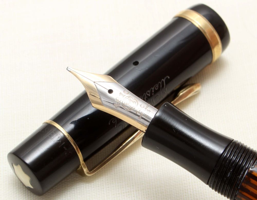 8873 Montblanc No.134 Piston filling Fountain Pen in Black Celluloid. Broad