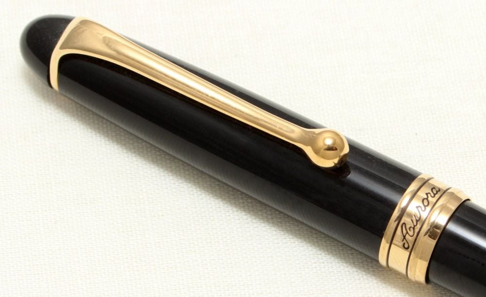 9052 Aurora 88 Ball Pen in Black with Gold filled trim.