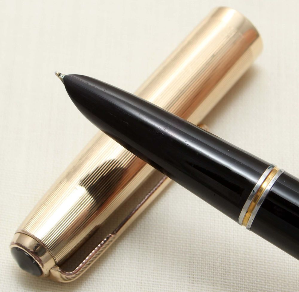 8810 Parker 51 Aerometric in Black with a Rolled Gold Cap. Smooth Fine Nib.