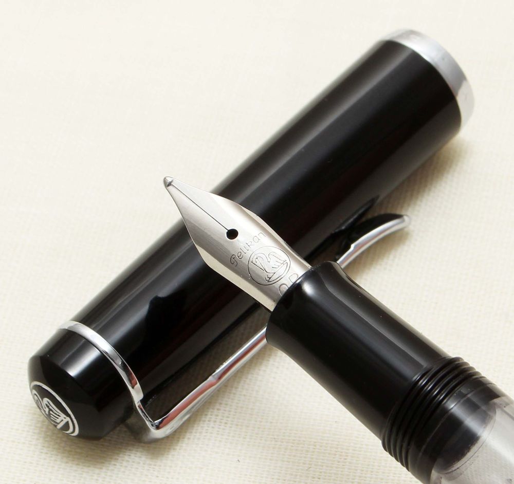 9245 Pelikan M100 Fountain Pen in Black with Chrome Filled trim. Broad Obli