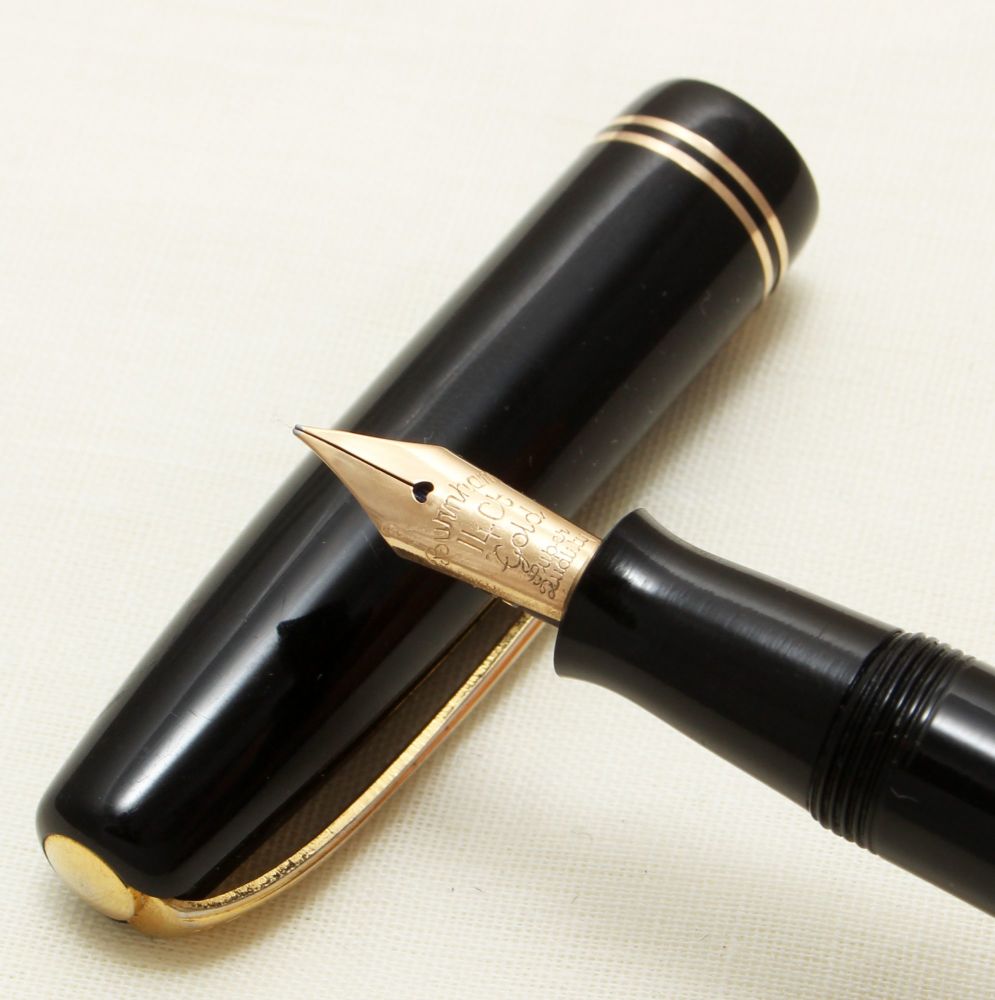 9258 Burnham No.55 in Black with gold Filled Trim. Fine FIVE STAR Nib.