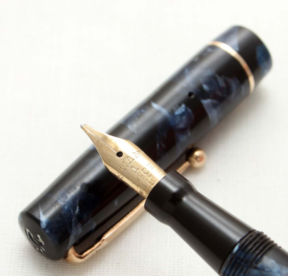 9557 Swan (Mabie Todd) Self Filler 6142 Fountain Pen in Blue Marble. Smooth