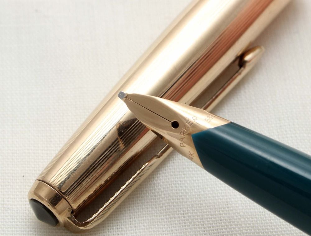 3238 Parker 65 in Teal Blue with a Rolled Gold Cap. Medium Nib.