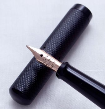 3309 Onoto "The Pen" in Black Chased Hard Rubber. Superb Medium Semi Flex FIVE STAR Nib.