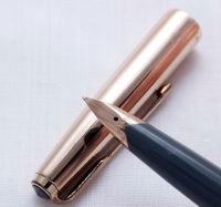 3422 Parker 65 in Grey with a Rolled Gold Cap. Smooth Fine FIVE STAR Nib.