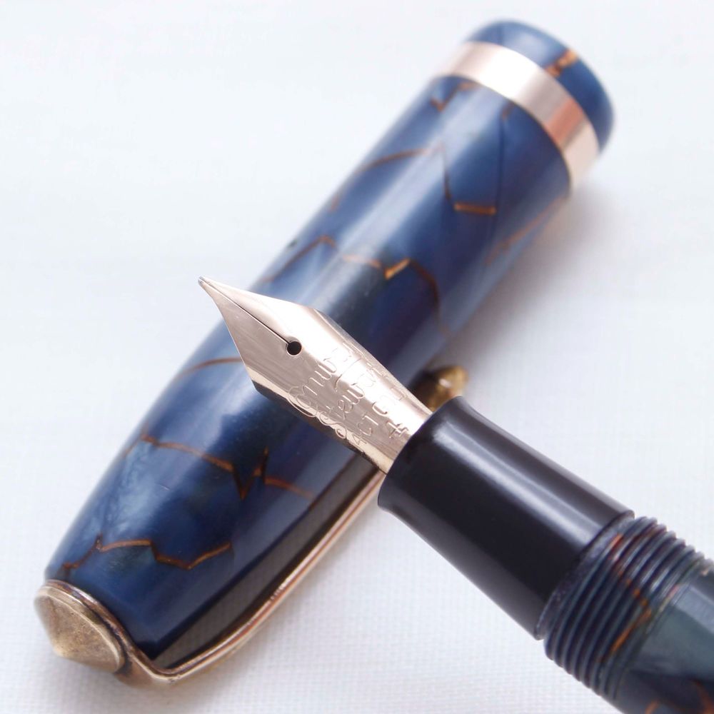 3481 Conway Stewart No.84 in Gold Veined Blue Marble. Medium FIVE STAR Nib.